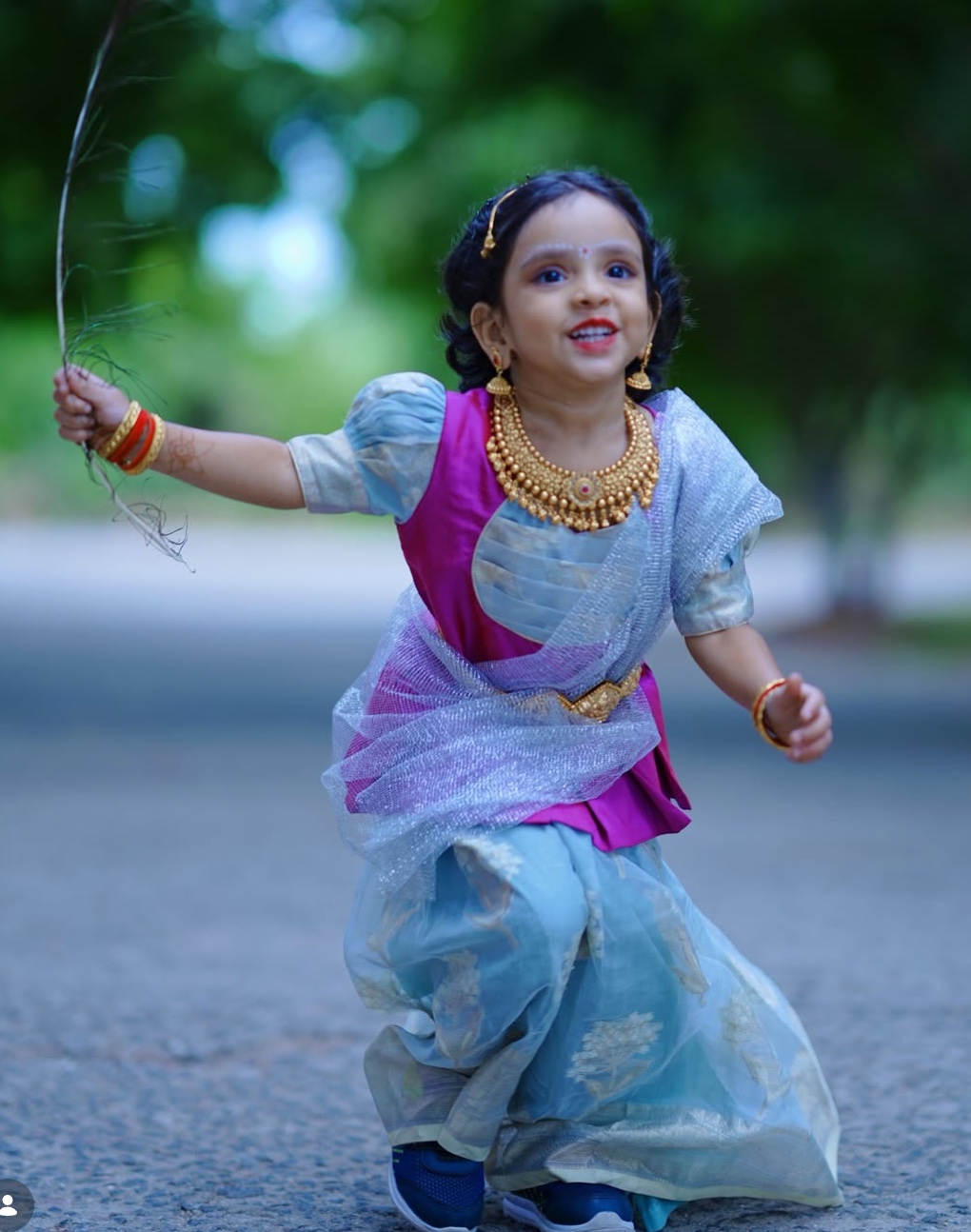 Young girl in customized pastel blue and magenta traditional South Indian pattu pavadai by Harsa Boutique