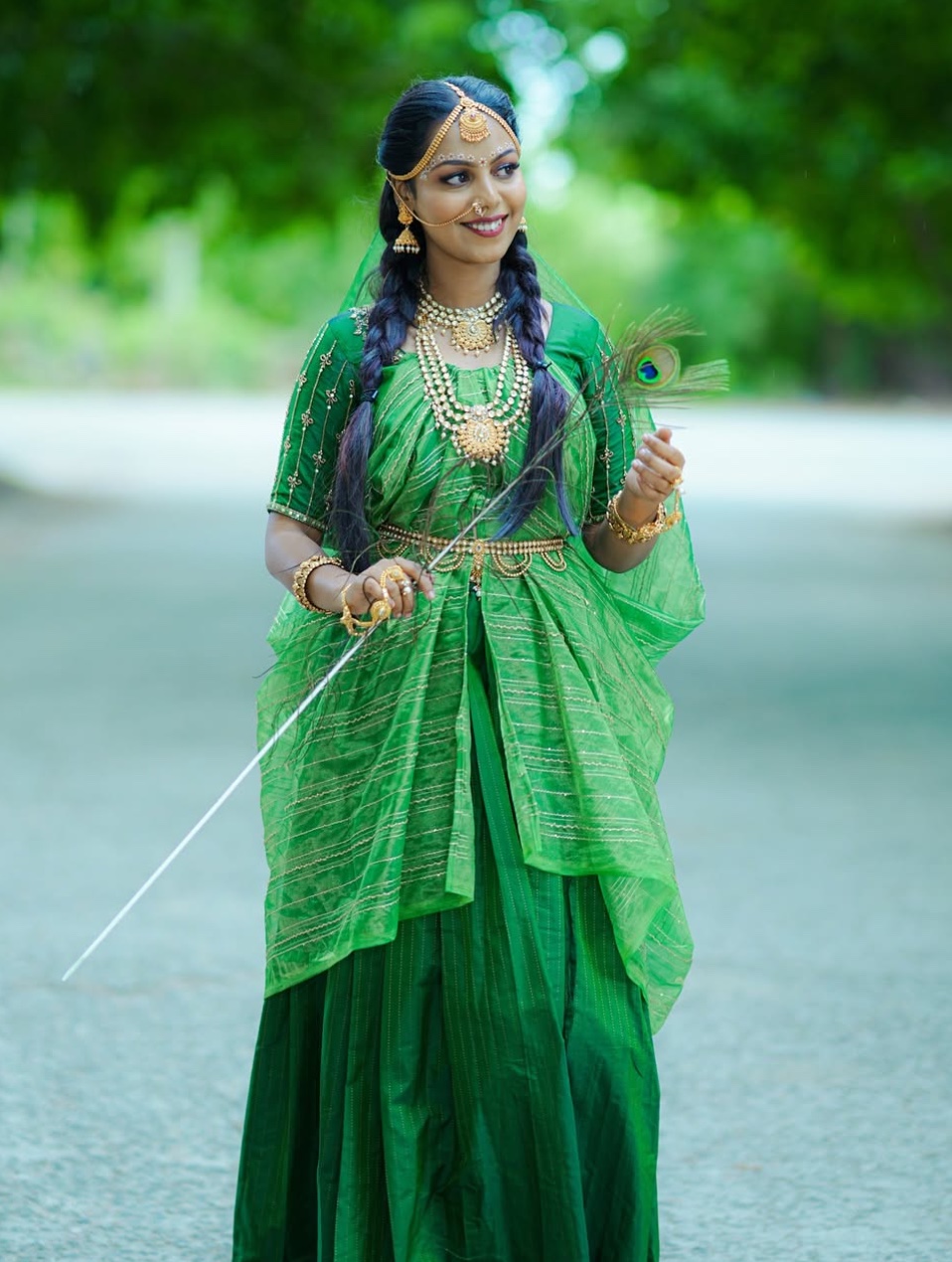 Elegantly styled bride in custom blouse and traditional South Indian silk drape